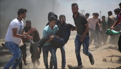 حدود غزة تشتعل بالغضب وتغرقها دماء مجزرة إسرائيلية