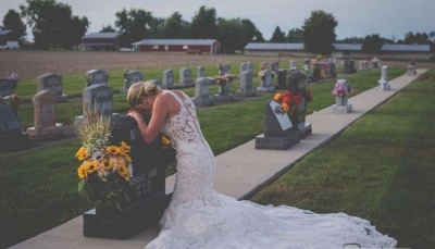 عروس تحتفل بزفافها في المقبرة (صور)
