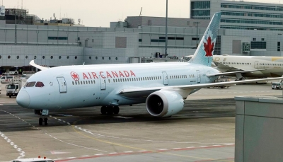 طيران كندا يجبر مسلمة على خلع حجابها أمام الركاب