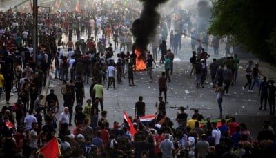 رغم إعلان حظر التجول..  العراق: المظاهرات تتجدد والحكومة تتواصل مع المحتجين