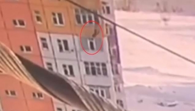 امرأة تسقط من الطابق التاسع ولم تصاب بأذى (فيديو)