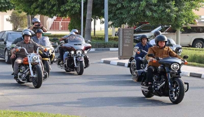 الرئيس البرازيلي يتجول في شوارع قطر بدراجة نارية (فيديو)