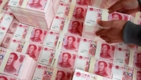 اليوان الصيني يسجل تراجعا قياسيا أمام الدولار الأمريكي 